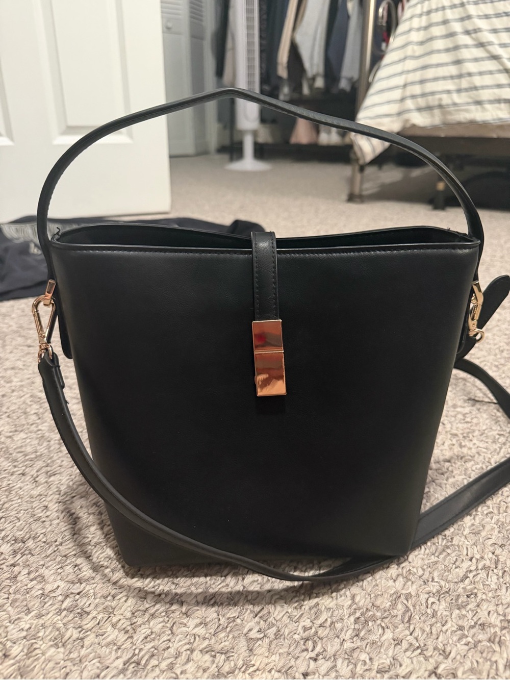 Classic Black Leather Bucket Bag with Gold Accent